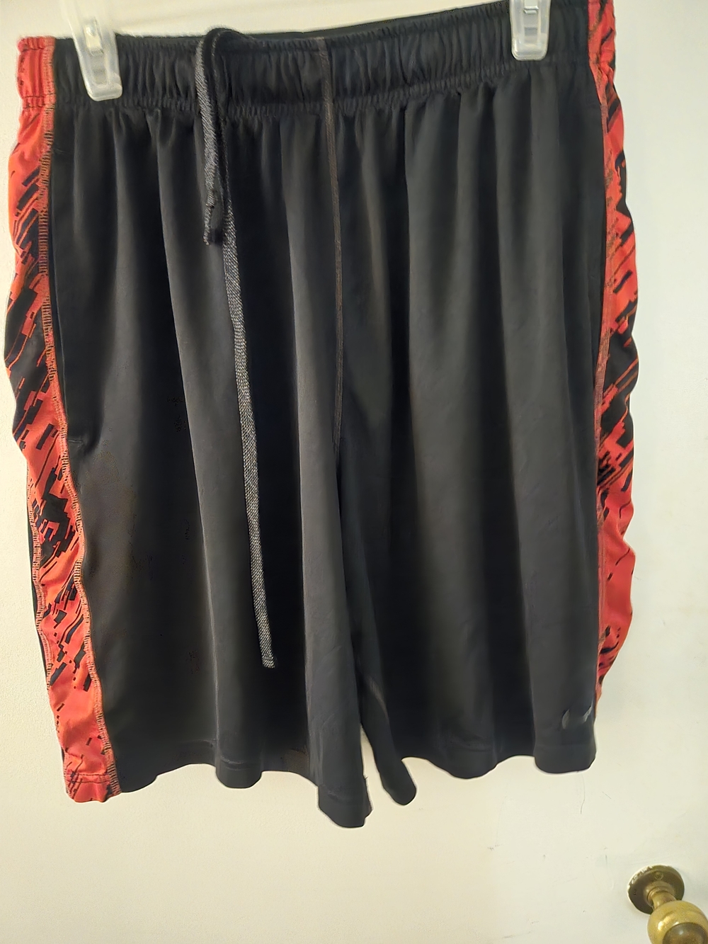 Nike Black Shorts with Orange Logo Accents